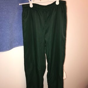 green varsity athletic pants